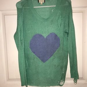 Cute sweater with intentional holes